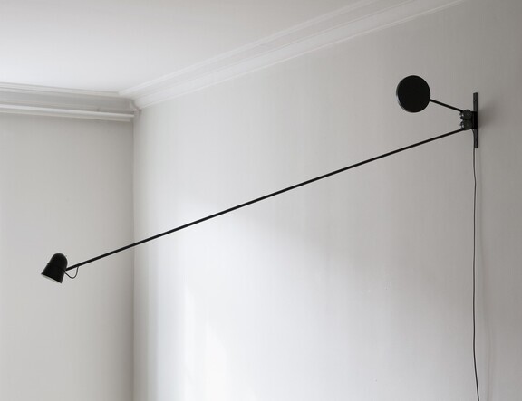 Counterbalance, 2011.

The idea of a wall-mounted counterbalanced lamp is made possible here through the use of cogwheels. Force is effectively reflected, allowing both counterweight and lamp to occupy the same space.
The lamp’s components also become two-dimensional graphic elements in a dynamic installation: counterweight and gears form stark circles intersected by lines of tubing. With a two-meter reach, the lamp’s operational ease arises, in part, from the use of a feather-light 5W LED light source. 

Photography: Kalle Sanner och Daniel Rybakken.